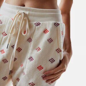 Anthropologie Cream Joggers with Colorful Accents